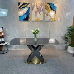 Bàn ăn mặt đá cao cấp chân bàn xoắn inox mạ titan AG 12