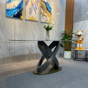 Bàn ăn mặt đá cao cấp chân bàn xoắn inox mạ titan AG 12